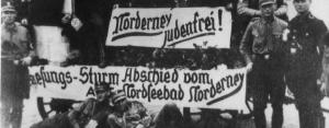 SS men celebrating Judenfrei status
