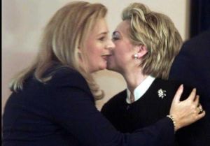 When Suha concluded, Hillary embraced her warmly and planted affectionate kisses on her cheek.